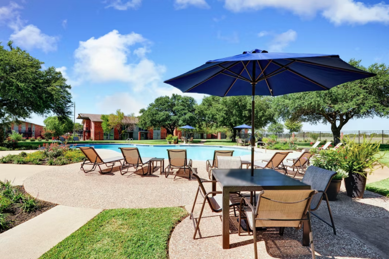swimming pool with chairs